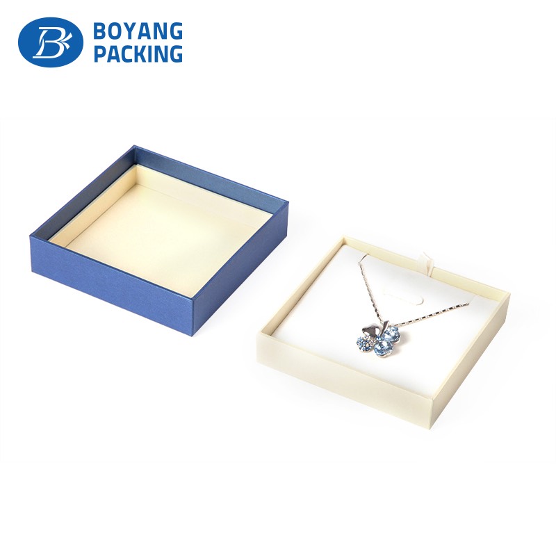 A set of custom cardboard jewelry boxes