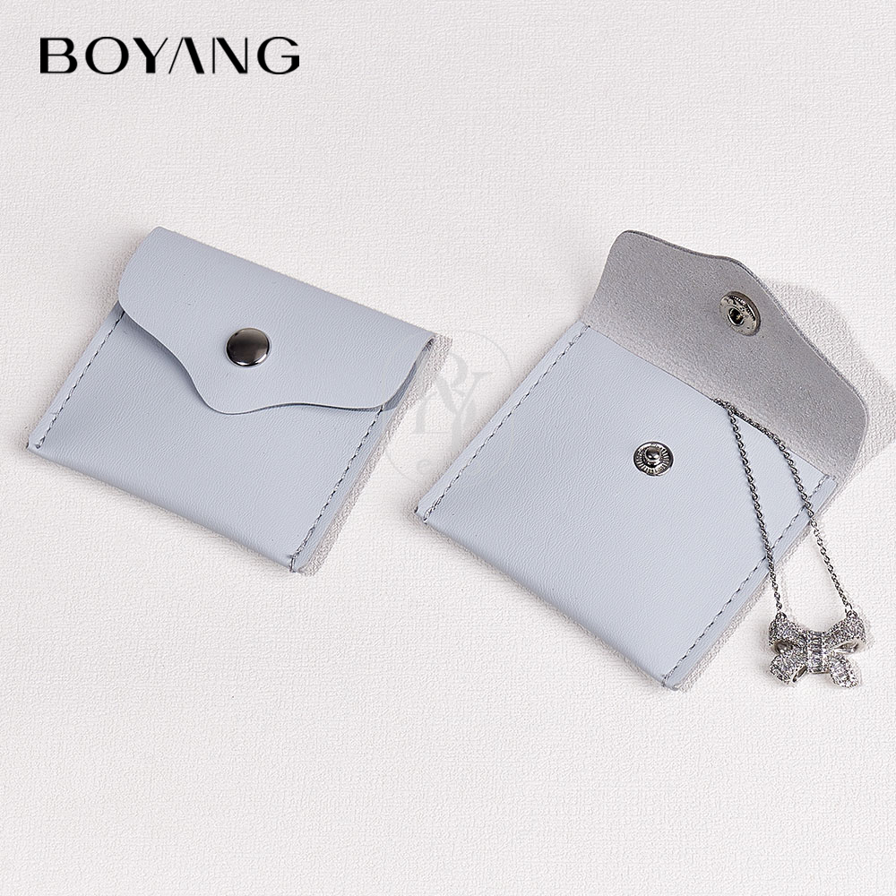 Boyang Custom Luxury Travel Microfiber Jewelry Packaging Bags Snap Button Jewelry Pouch with logo